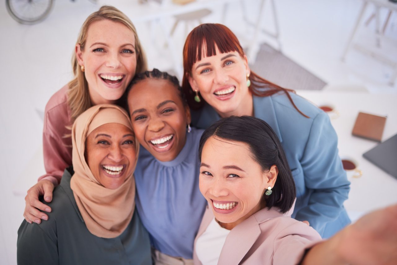 Women smiling together